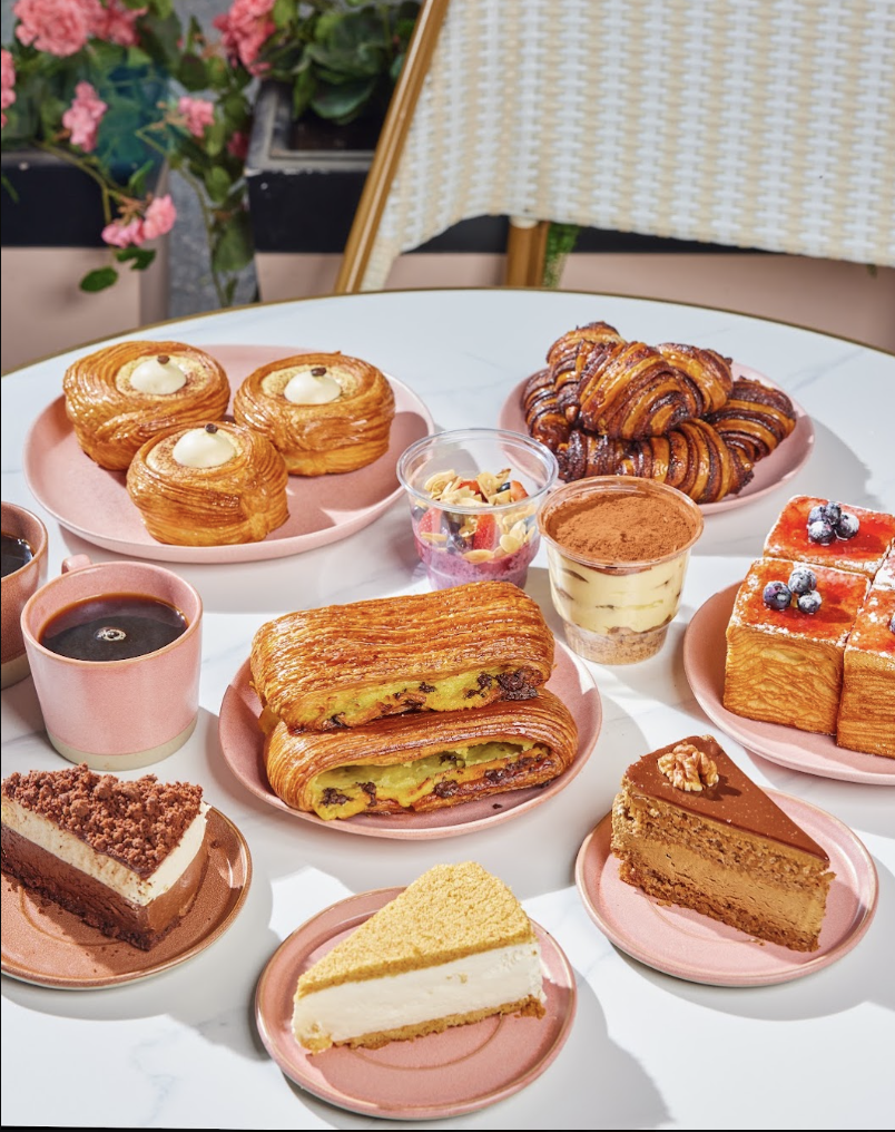 A Bready catering table set with pastries and trays